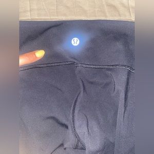 Mid rise Lululemon leggings size 4.